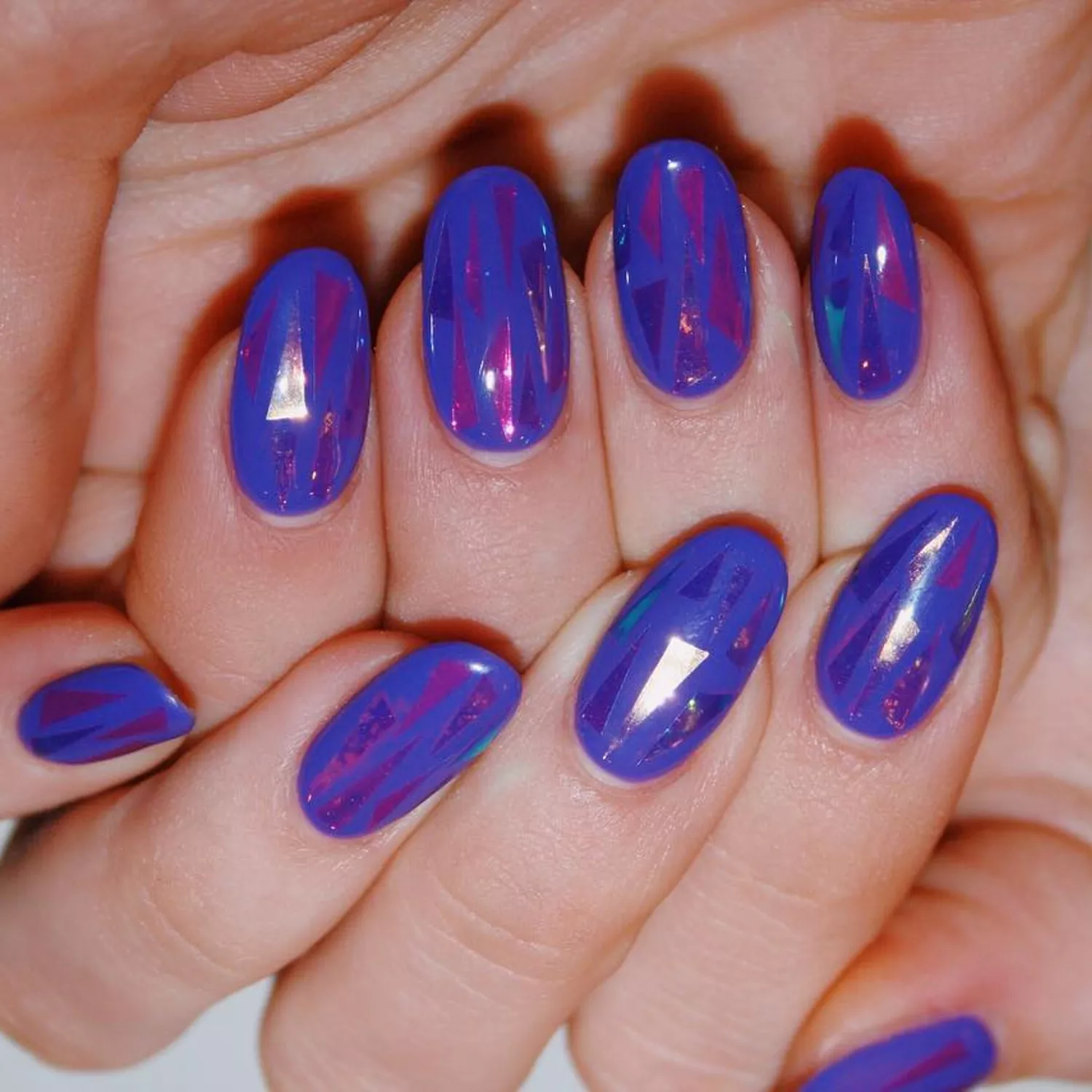 7 Electric Blue Nail Ideas That Are Bright and Bold