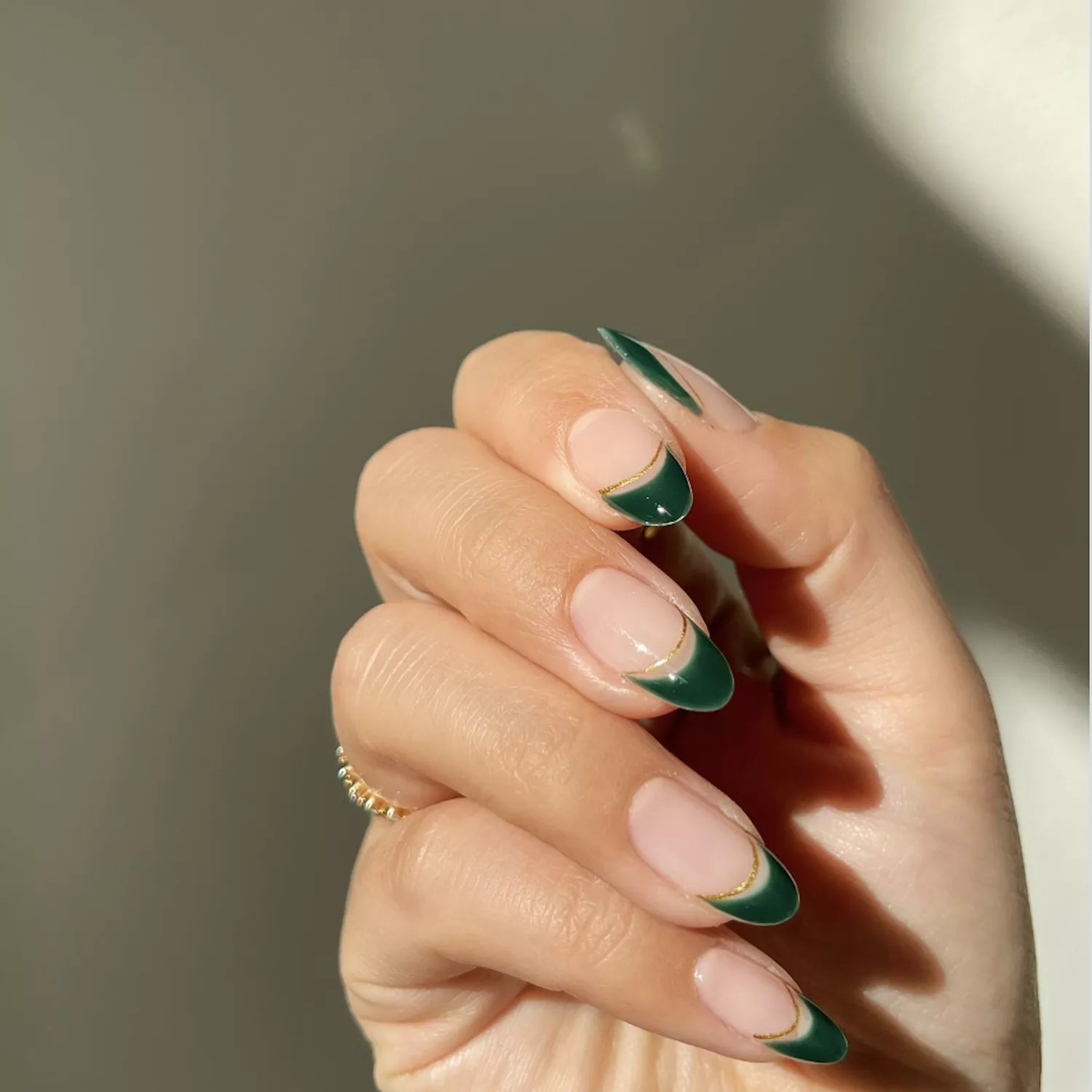 7 Evergreen Nail Ideas For an Earthy Pop of Color